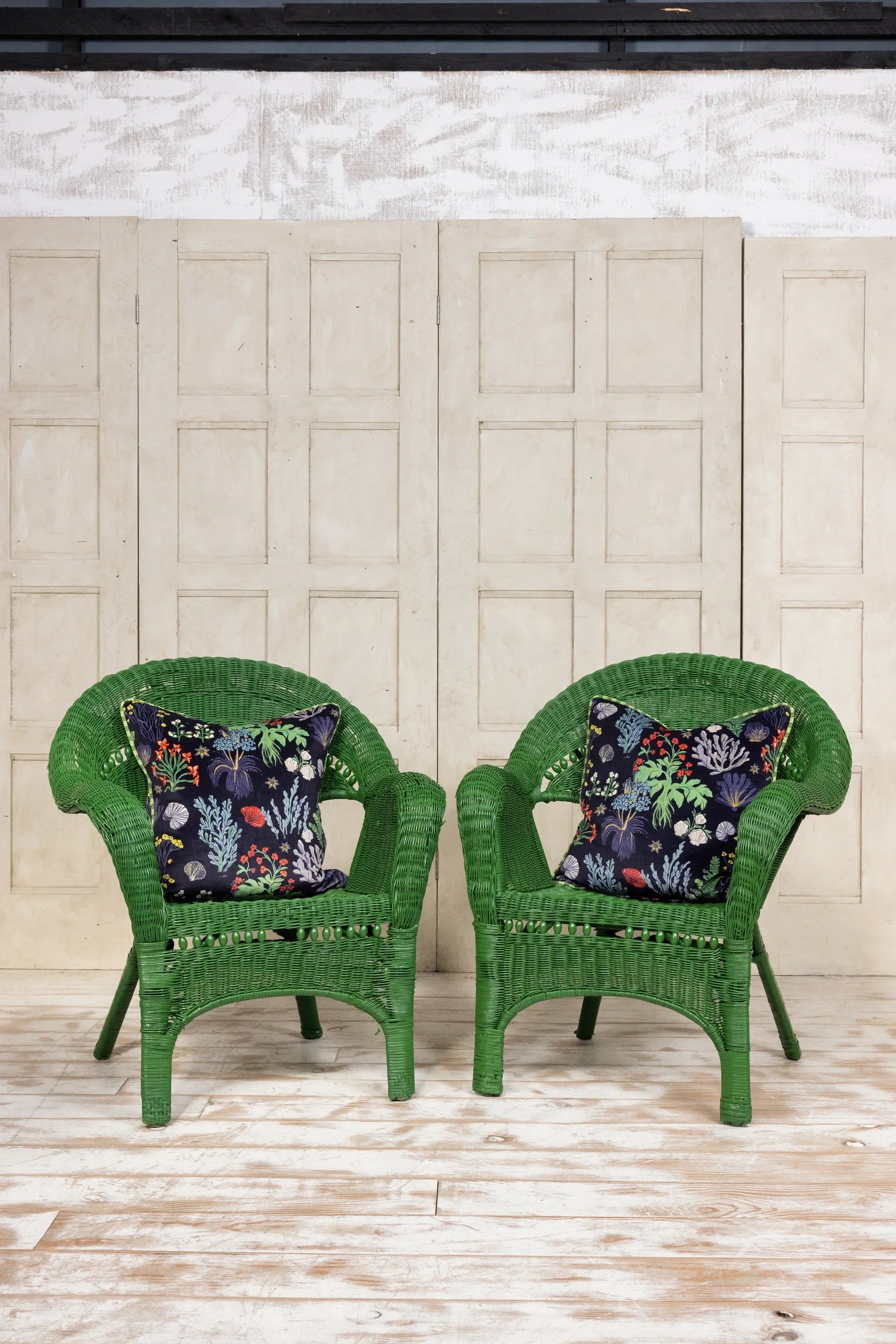 Pair of vintage coastal woven rattan lounge chairs. 1920's